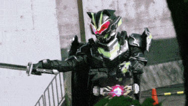 a man in a superhero costume is holding a sword in his right hand