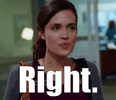 a woman is standing in a hallway with the word right written on her face .