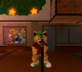 a stuffed animal is singing into a microphone in front of a christmas tree
