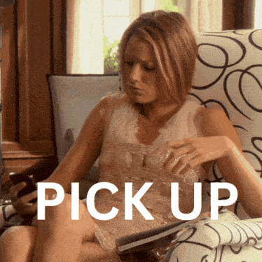 a woman sitting in a chair with the word pick up written below her