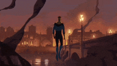 a man is flying through the air in front of a city with fire coming out of the ground .