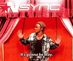 a man is standing in front of a sign that says sync it 's gonna be may