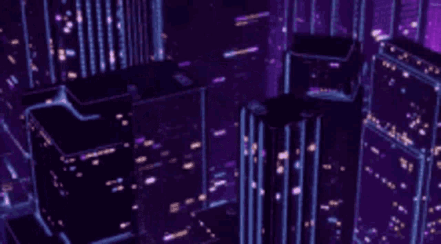 an aerial view of a futuristic city at night