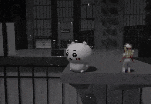 a stuffed animal is sitting on top of an american flag