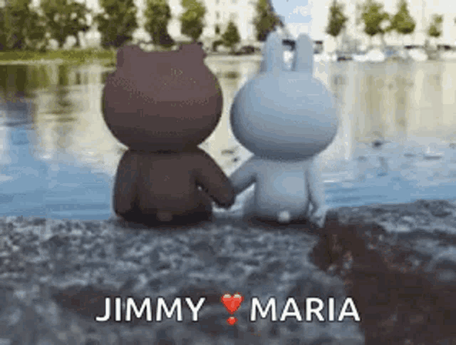 a brown bear and a white rabbit are holding hands in front of a body of water