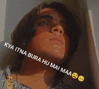 a close up of a man 's face with the words kya itna bura hu mai maa above him