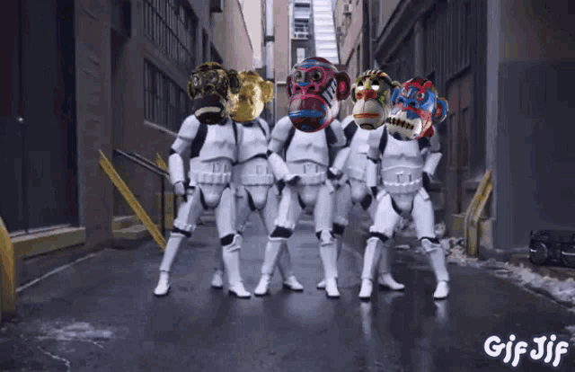 a group of stormtroopers with masks on their heads are dancing on a street