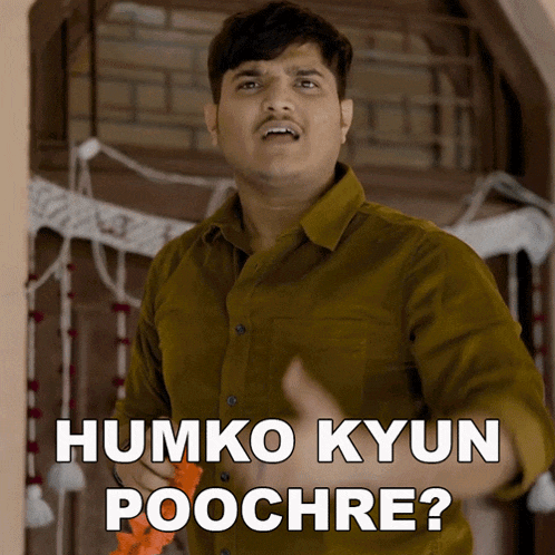 a man in a brown shirt is saying humko kyun poochre ?