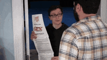 a man in a plaid shirt is holding a piece of paper that says ger contract