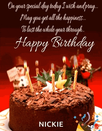 a birthday cake with candles on it and the name nickie on it