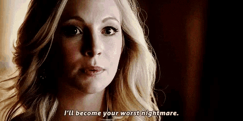 a close up of a woman 's face with the words `` i 'll become your worst nightmare '' on it .