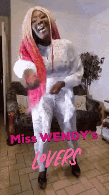miss wendy 's lovers is written in pink on a picture of a woman dancing