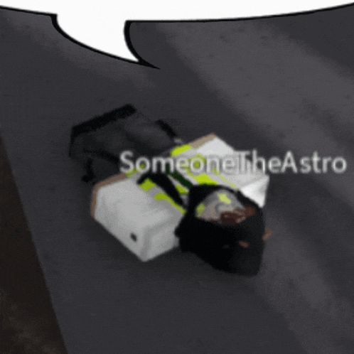 someone the astro is laying on the ground with a bag on his back