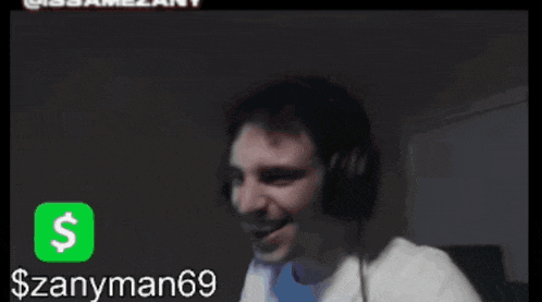 a man wearing headphones is smiling with a dollar sign in the corner