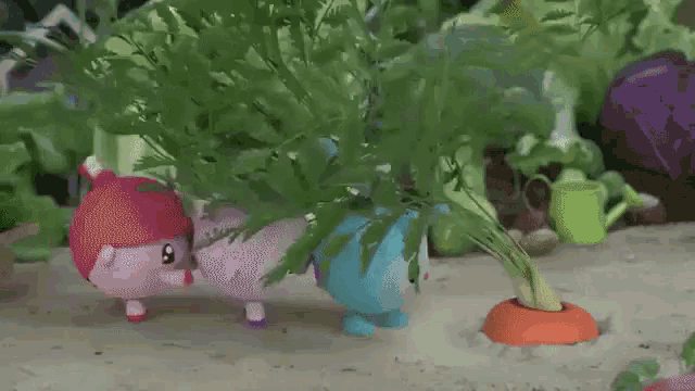 a bunch of stuffed animals are in a garden with vegetables