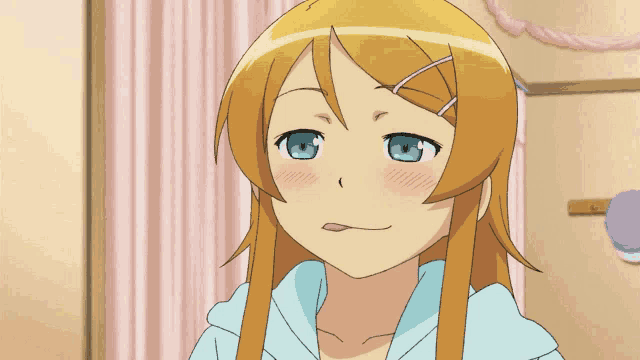 a girl with long blonde hair and blue eyes looks at the camera