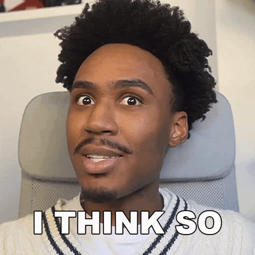 a man with an afro says i think so in front of his face
