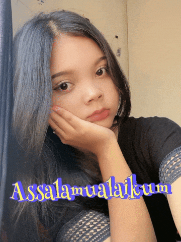 a girl is taking a selfie with the words assalamualaikum on the bottom right