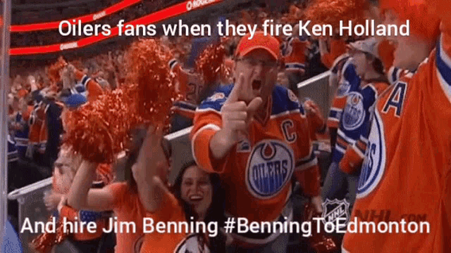 a man in an oilers jersey is pointing at something