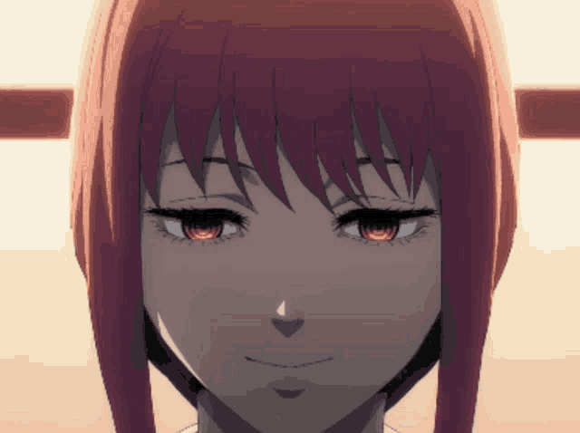a close up of a girl 's face with red hair and red eyes