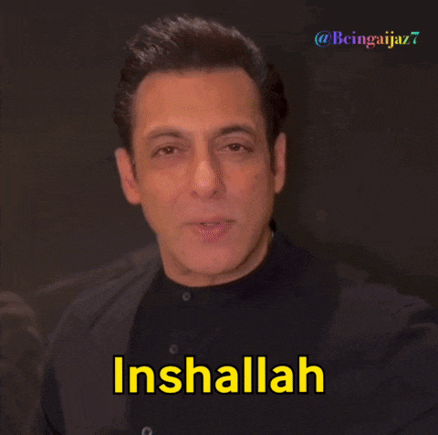 a close up of a man 's face with the word inshallah written on it