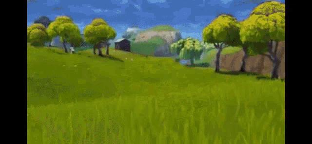 a person is flying through the air in a video game in a field with trees .