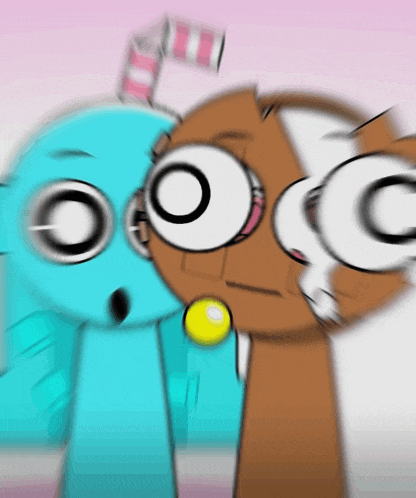 a blurry picture of two cartoon characters with the letter c on their face