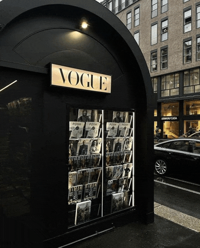 a store front with a sign that says vogue on it