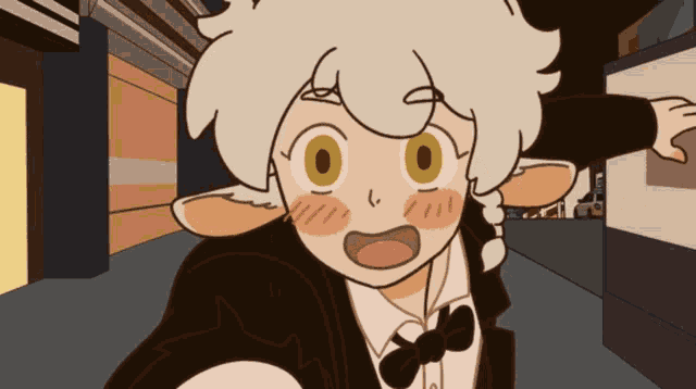 a cartoon character in a tuxedo and bow tie