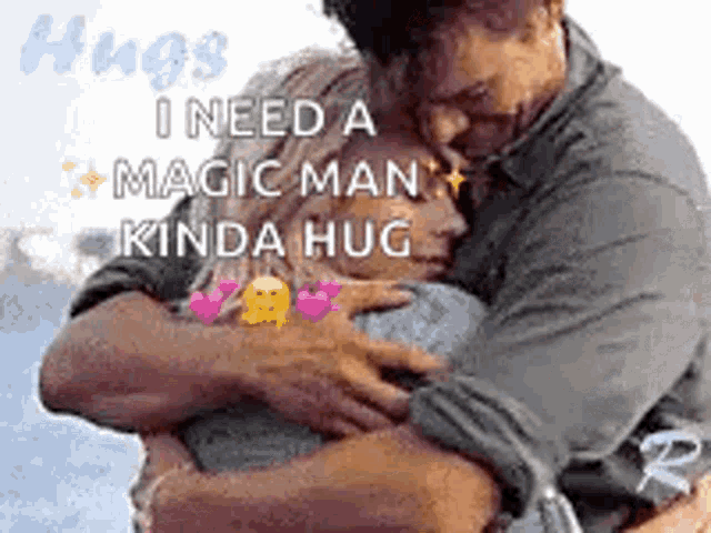 a man and a woman are hugging each other .