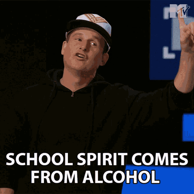 a man wearing a white hat and a black hoodie says school spirit comes from alcohol