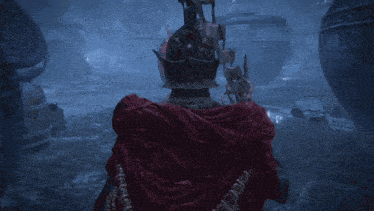 a video game character with a red cape and a helmet on
