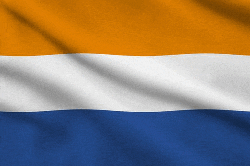 an orange , white and blue flag waving in the wind