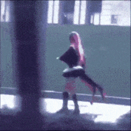 a woman in a pink wig is carrying another woman in a black dress