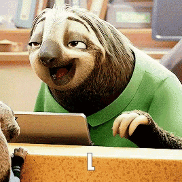 a sloth in a green shirt is smiling and looking at a tablet