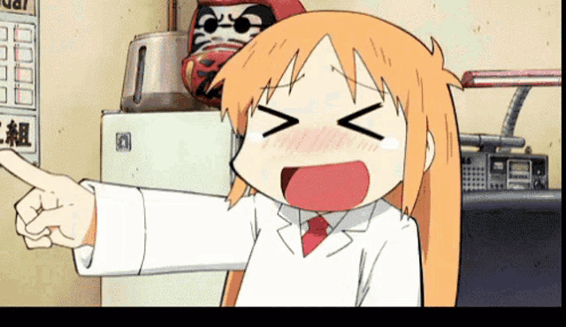 a cartoon character is pointing at something in front of a wall with chinese characters on it