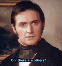 a man in a suit and tie is talking to someone and says `` oh , there are others ? ''