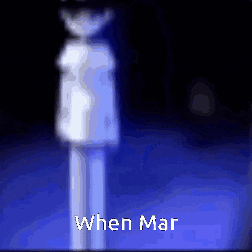 a blurry image of a person with the words " when mar " written on the bottom