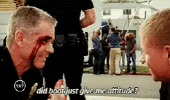 a man with blood on his face is talking to another man with the words " did boot just give me attitude " on the bottom