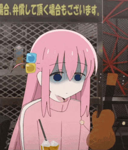 a girl with pink hair and blue eyes is standing in front of a sign that says ' a ' on it