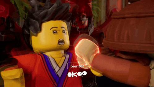 a lego character with the word bientot on the bottom