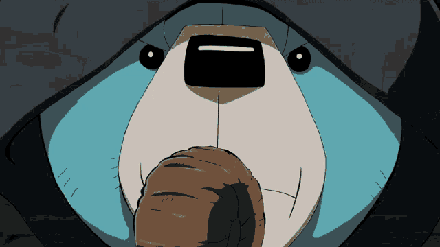 a close up of a teddy bear 's face with a black hood on