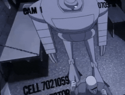 a man stands in front of a robot that has the number 7021059 on it