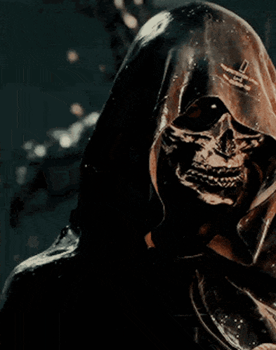 a close up of a person with a hood on covering their mouth