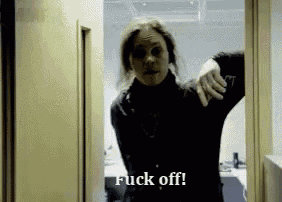 a woman standing in a doorway with the words " fuck off " written on the bottom