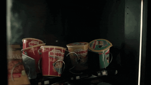 a vending machine filled with instant noodles