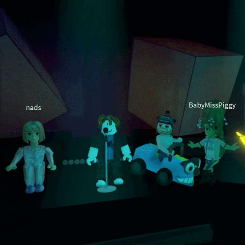a group of cartoon characters including nads and babymisspiggy are in a dark room