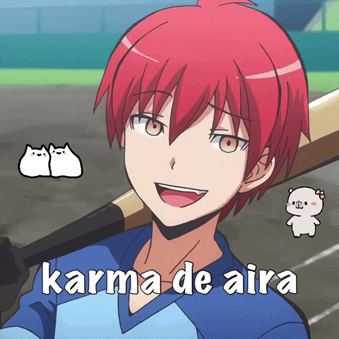 a boy with red hair is holding a baseball bat with the words karma de aira written on it