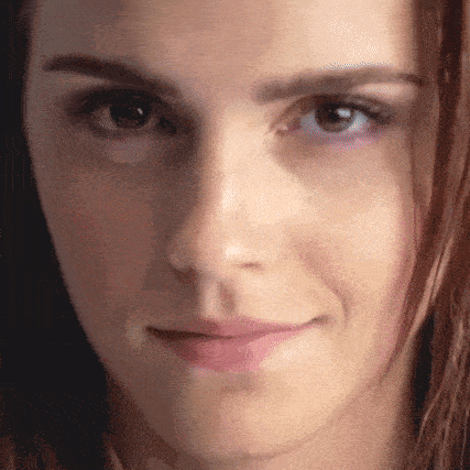 a close up of a woman 's face with her eyes closed
