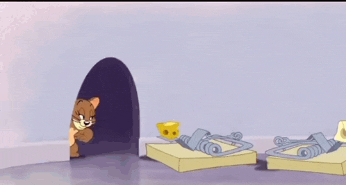 a cartoon of jerry jumping over a mousetrap